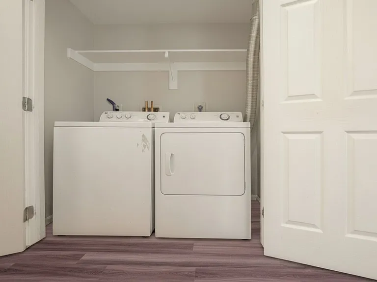 Includes washer and dryer on first level with new LVT flooring