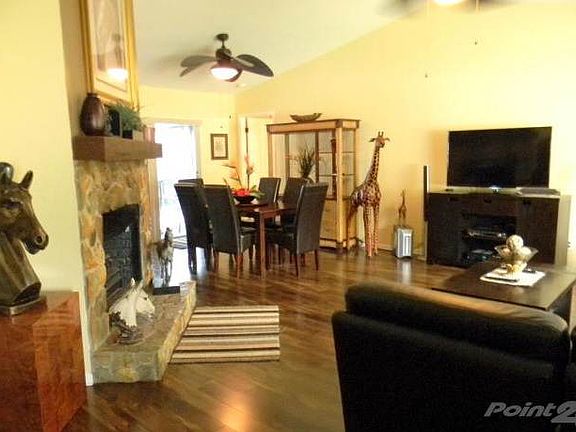 Spacious Living Room with Laminate Wood Flooring