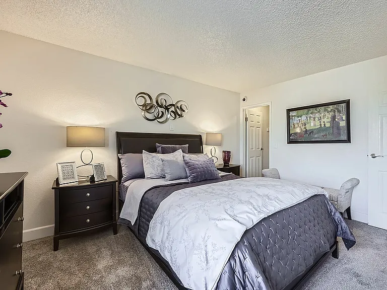 Unwind in your elegant bedroom sanctuary with plush comforts and chic design.
