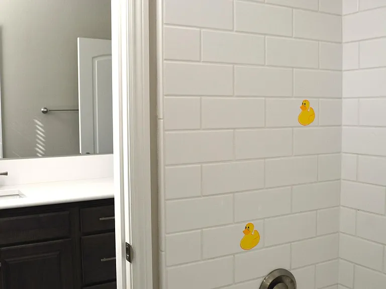 Bathroom 3 - the photo shows the bathtub, and the double sinks in the separate room.