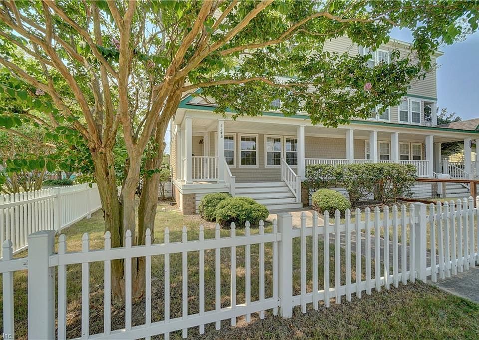Charming Ocean View twinhome sits on lovely corner directly across the street from the beautiful beach of the Chesapeake Bay!