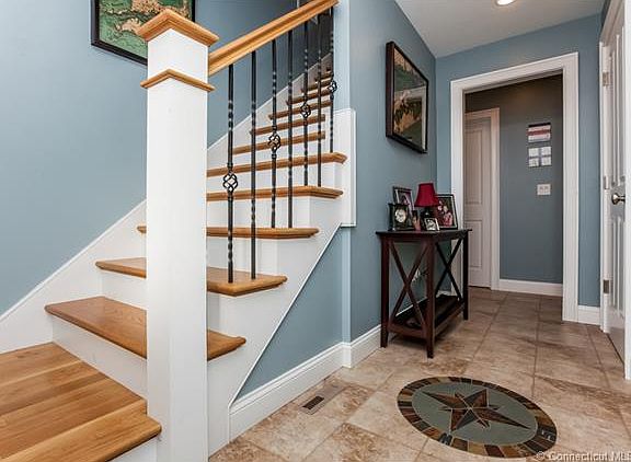 Tile front entry leads to l...