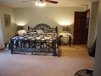 This master bedroom is BIG and features a full wall of closets PLUS a walk- in closet!