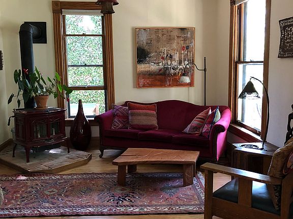 Living room, with wood fire place.