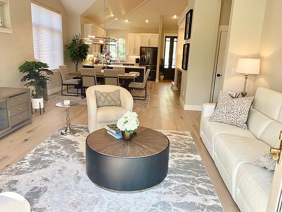 Living room, dining room and kitchen view