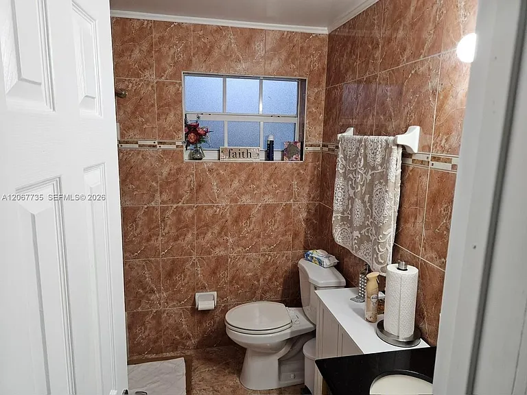 695 W 76th St — Photo 15