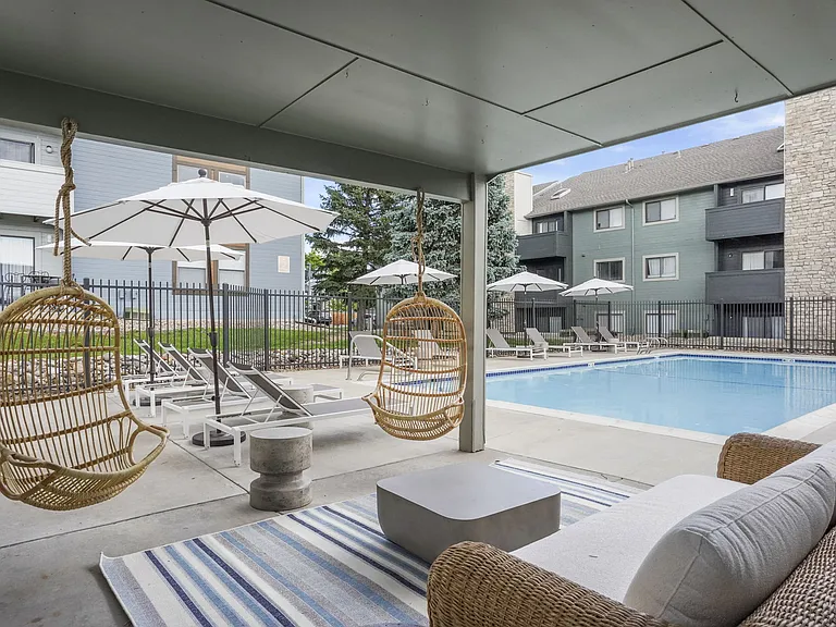 The Community Pool and Lounge Area at Hilltop View Apartments