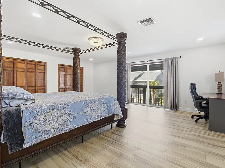 Upper level master with balcony access