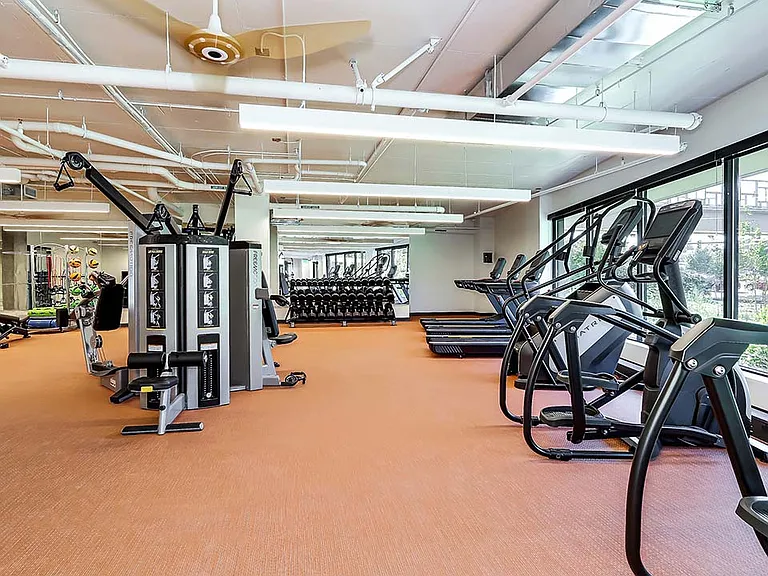 Griffis Shoreline fitness center with cardio machines and weight equipment.