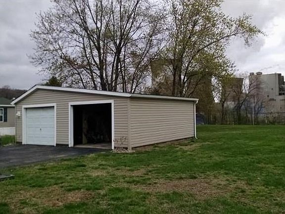 Spacious garage space for all your lawn equipment.