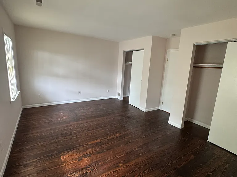 Primary bedroom includes door to bathroom.