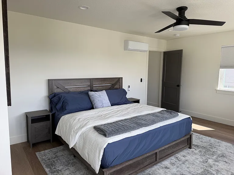 Upper level master bedroom with king bed