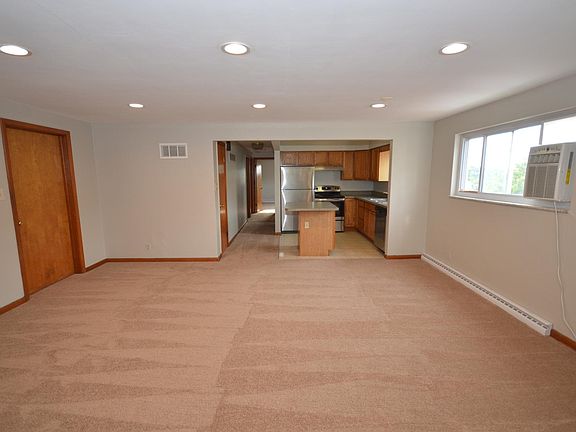 Newly renovated living room. Fresh paint, new carpets, and