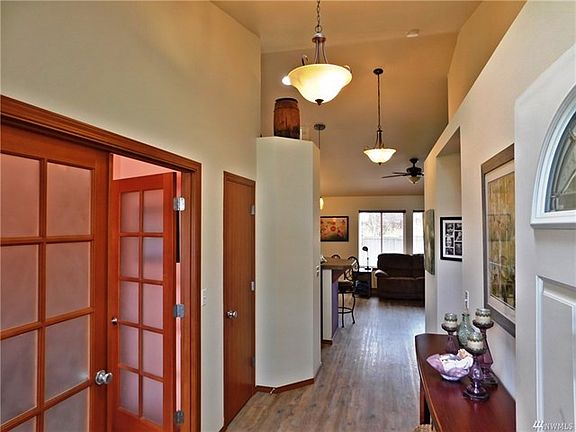 Frosted panel doors to your new mystery room lead you to your open floor plan.