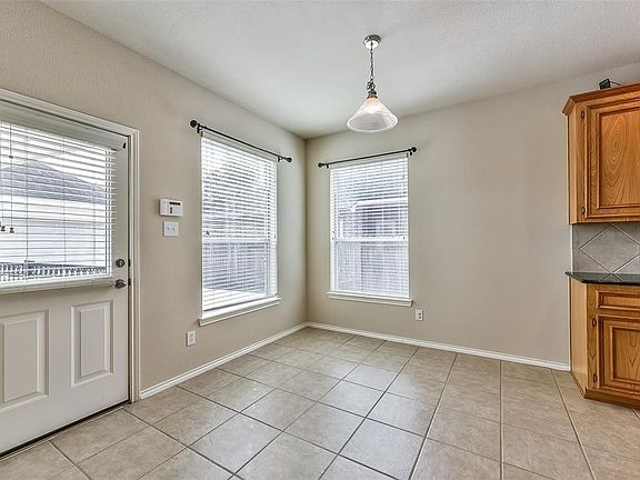 Bright Breakfast Room with access to backyard & deck.