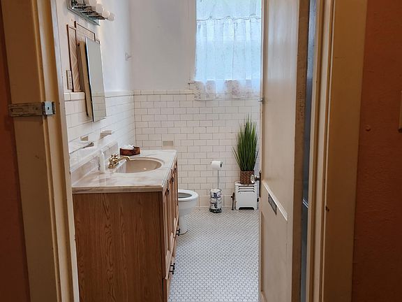 Downstairs Bath #1 with walk in shower for rooms #1, #2 and #3.