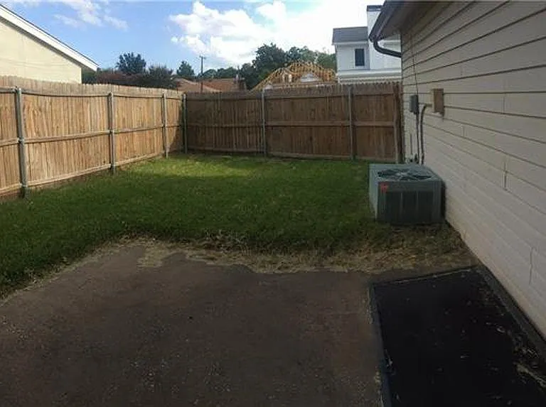 Fenced back yard w/patio