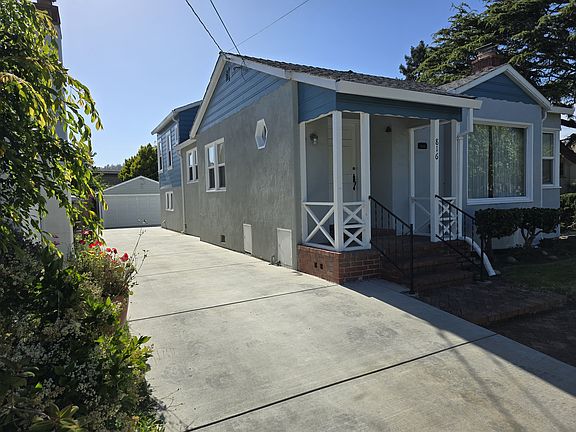 Front Door, Drive way Garage in the background
