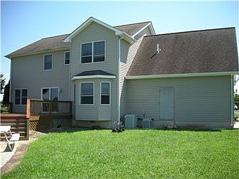 Rear with large custom deck