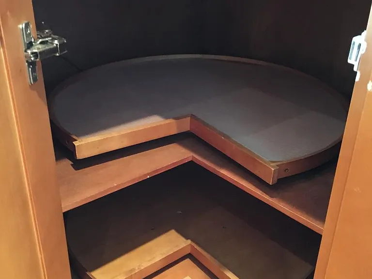 Lazy susan in corner cabinets of the kitchen.