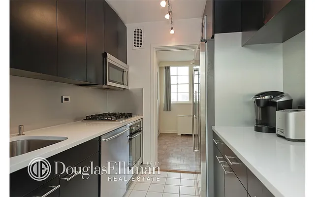 Sold by Douglas Elliman | media 18
