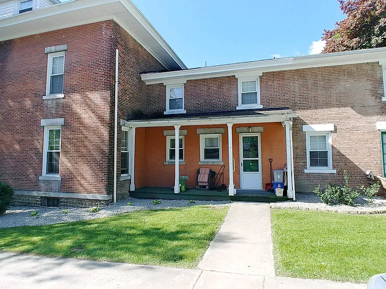 Entry to Apt. B is the door on this private porch.