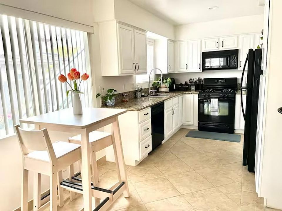 A fully equipped kitchen has everything you need to prepare meals.