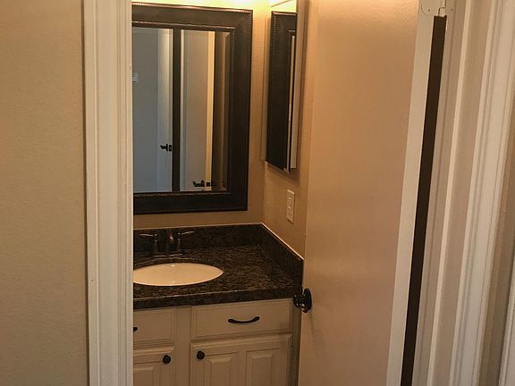 Second view of bathroom from hallway.