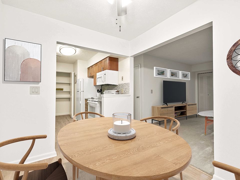 Open Concept Kitchen, Dining, and Living Room (Shown here in a 2-bedroom floor plan with model furniture)