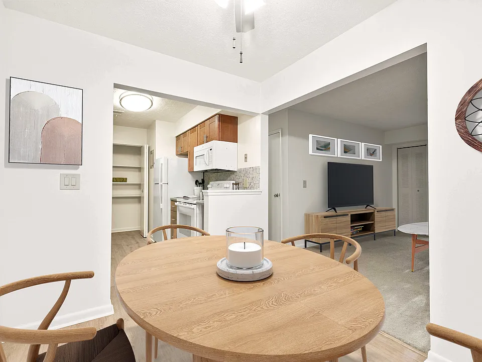 Open Concept Kitchen, Dining, and Living Room (Shown here in a 2-bedroom floor plan with model furniture)