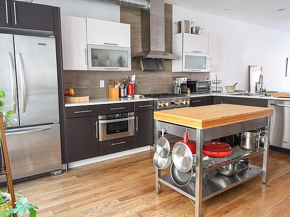Kitchen with Monogram Gas Range and Oven