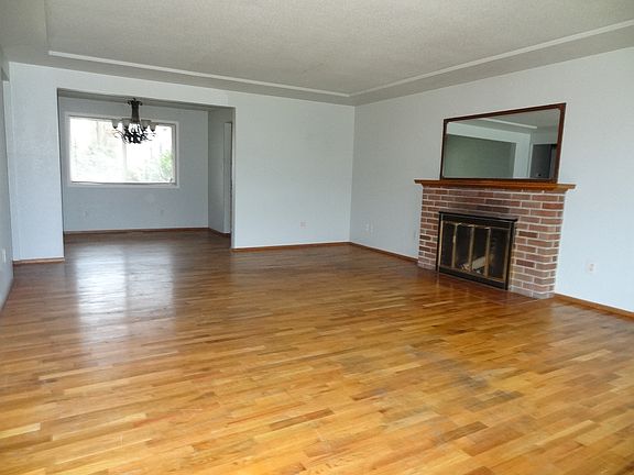 Living room w/wood fireplace