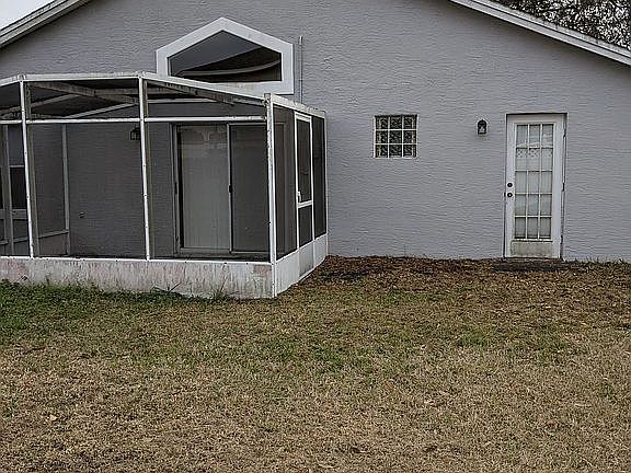 Rear of house, screen room