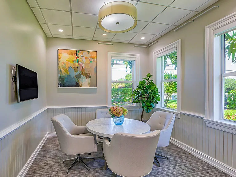 A conference room perfect for a meeting, presentation, or to get work done.