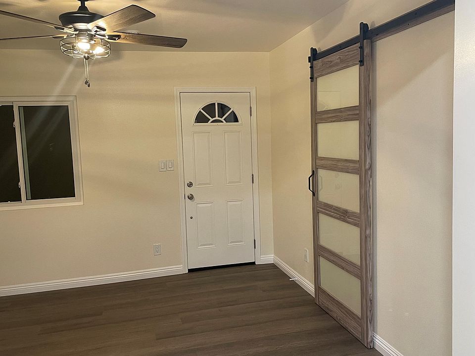 Living room with new barn door.