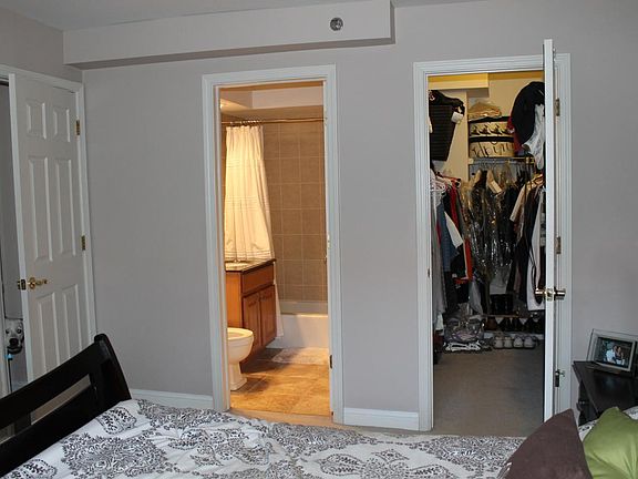 Master bedroom with walk in closet and master bath