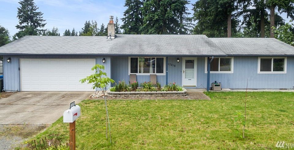 Inviting home with well maintained front yard.
