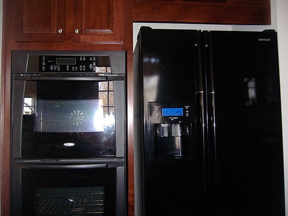 Double wall convection oven and Samsung Fridge with Dark Cherry Cabinets