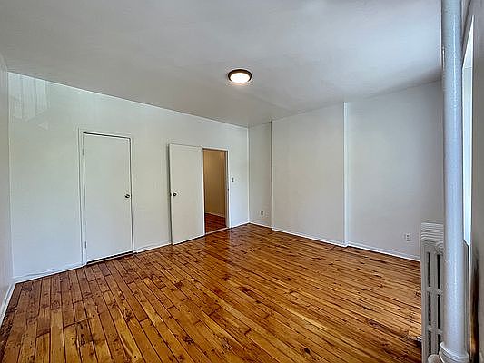 5th image of 329 E 116th St APT 1