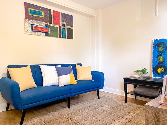 Living area with twin fold out couch