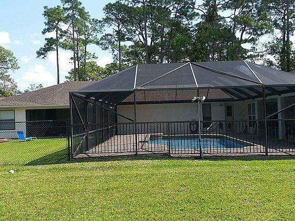 Screened pool main house