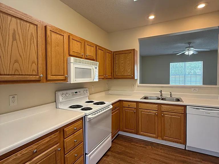 Beautiful well lit kitchen.