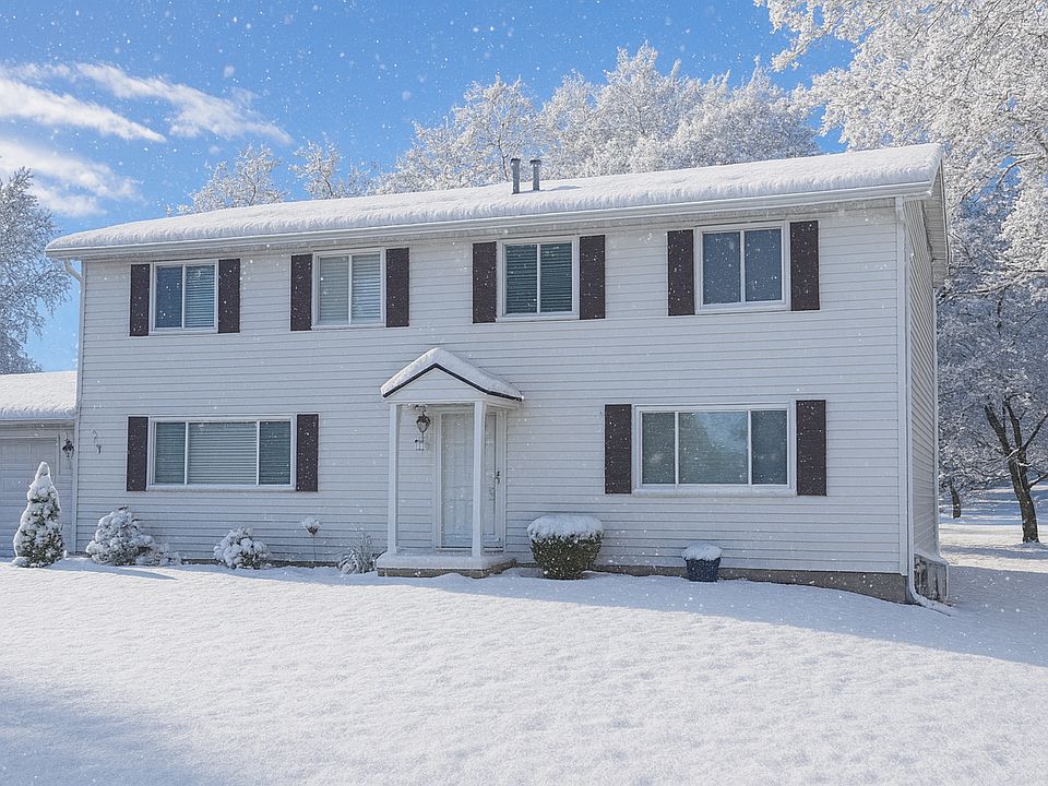 Front - Entrance to unit is to the left near the garage (hidden from this view)