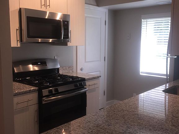 Renovated kitchen! Granite counter tops, stainless steel appliances, track lighting & new cabinets!
