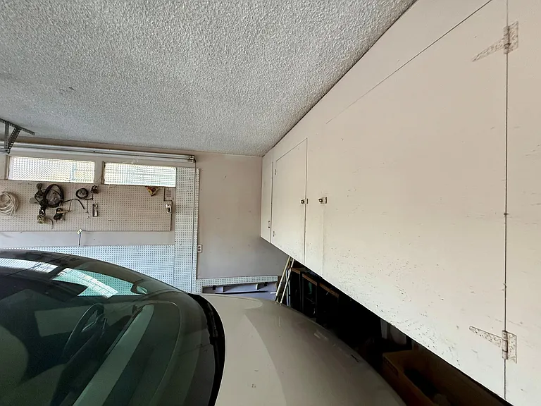 Available extra storage over car in garage