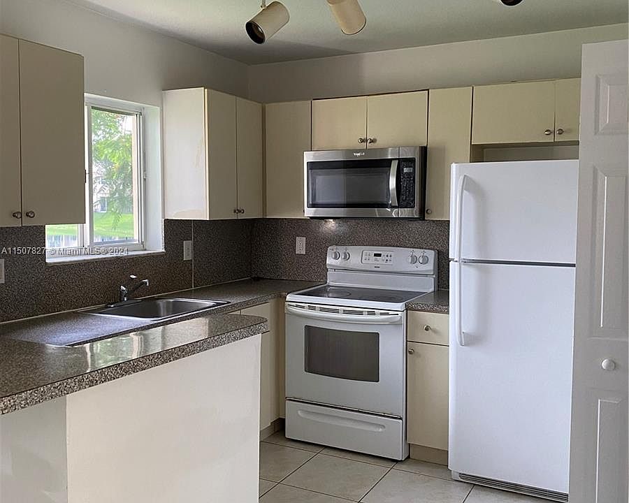 1st image of 1261 SE 27th St Unit 106