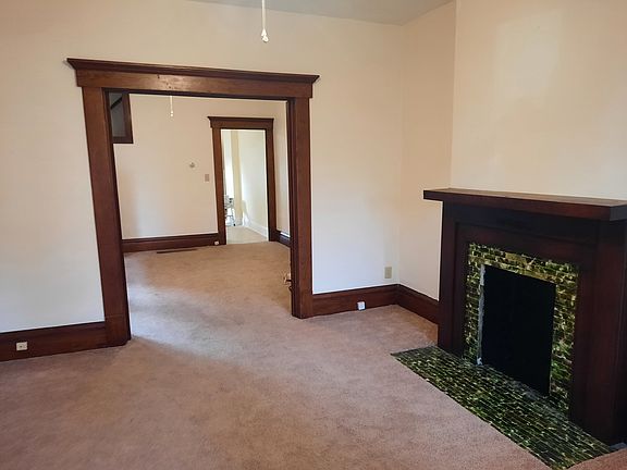 Living Rm with decorative fireplace
