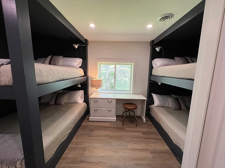 Our bunkroom offers 4 comfortable new queen mattresses. The two bunk systems will accommodate up to 8 people