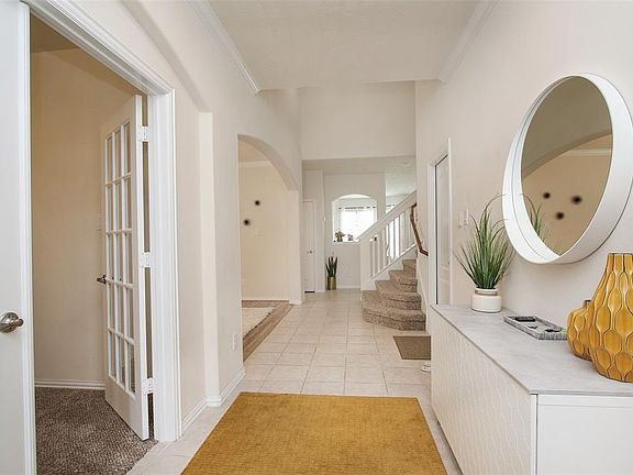 Entry into this pretty home. Home Office is to the left.
