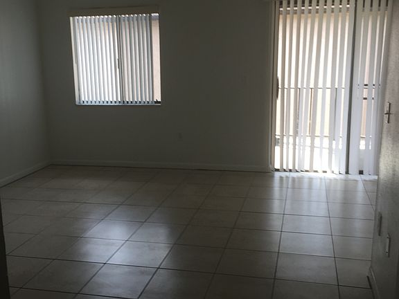 Large living room with large patio outside